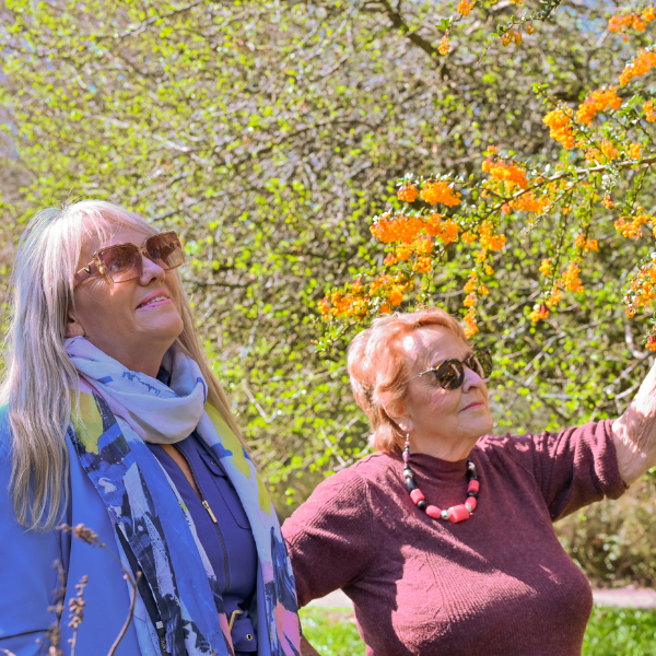 Two ladies admiring the plants